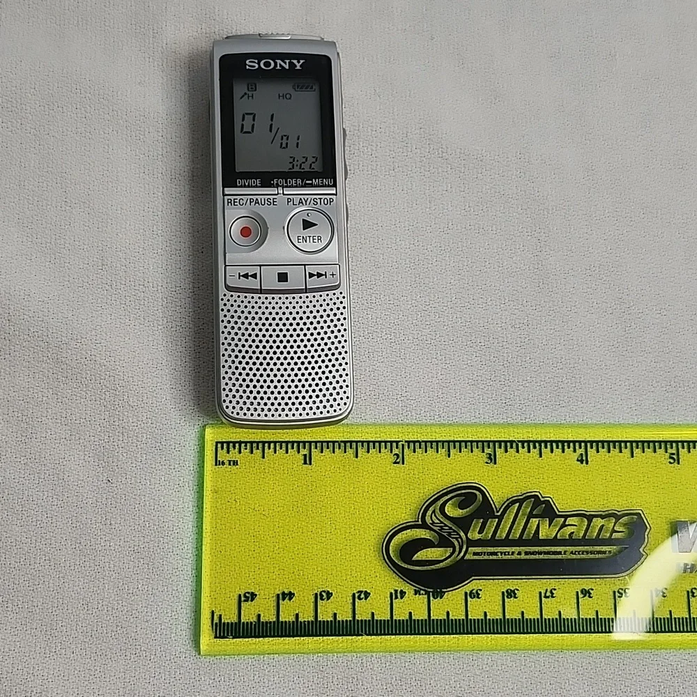 Sony ICD-BX800 Recorder, headphones and Sharp EL-W516 Calculator